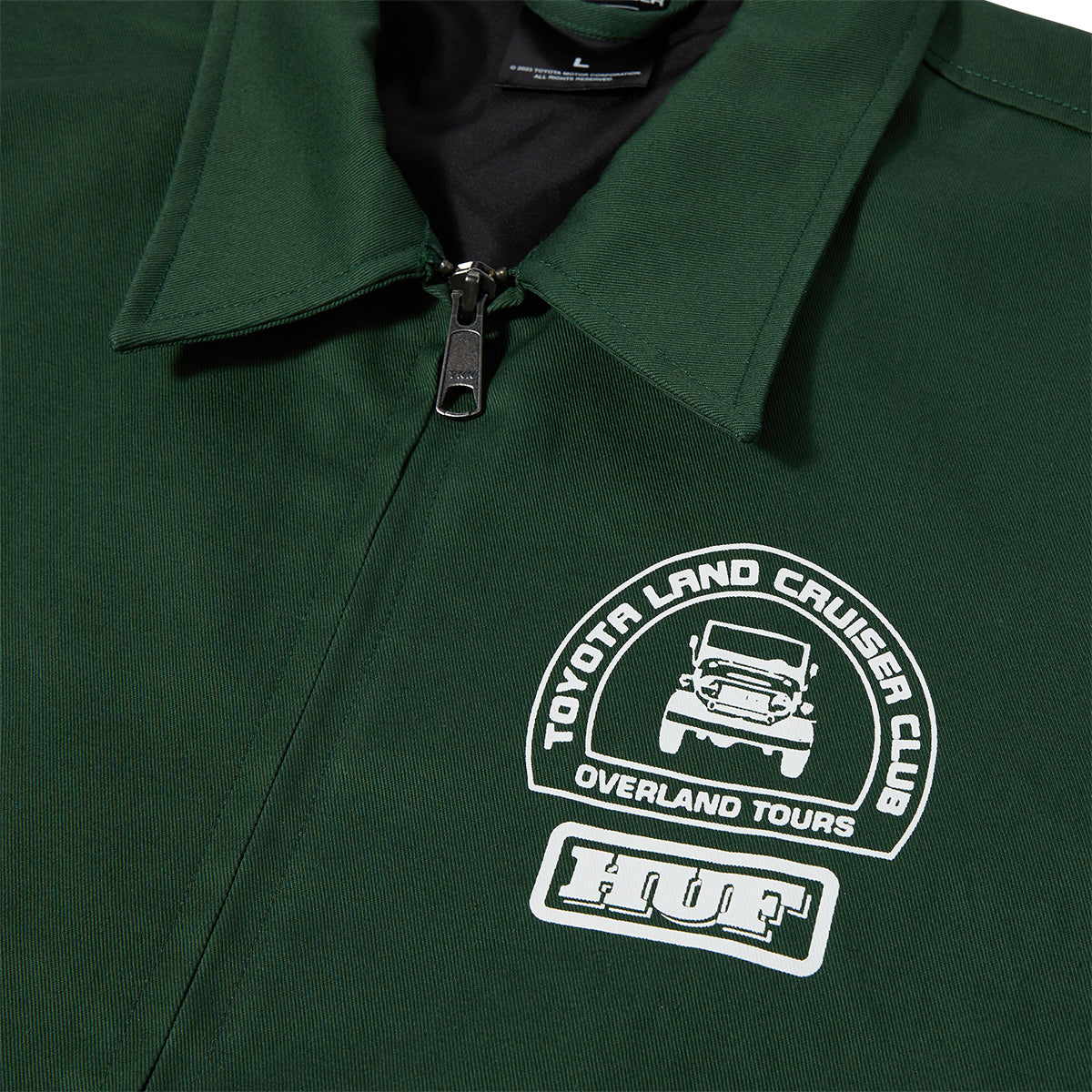 CHAQUETA HUF X TOYOTA PARTS & SERVICE FOREST GREEN