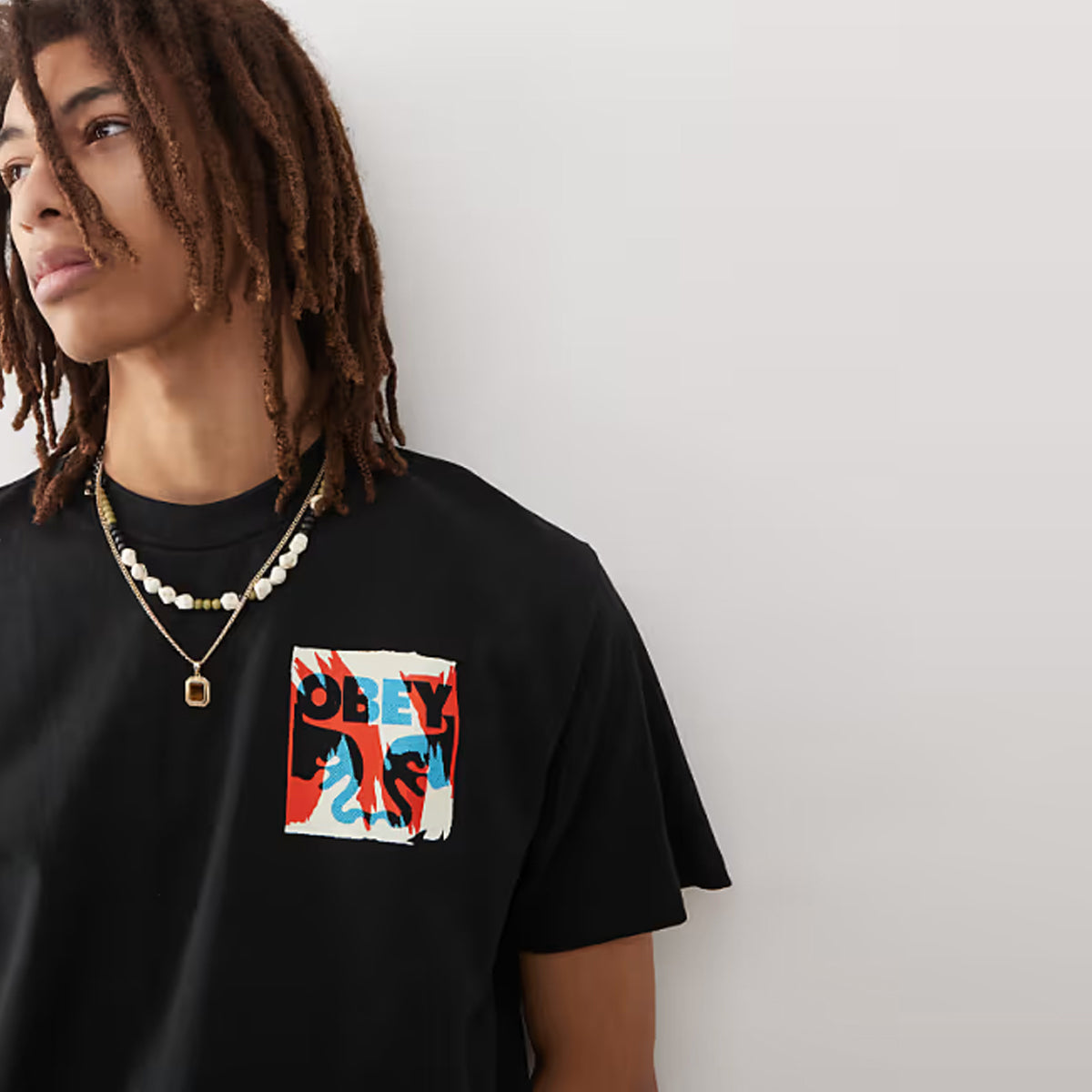 POLERA OBEY TORN POSTERS ICON BLK